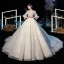 Style Victorien Champagne Transparentes Robe De Mariée 2020 Robe Boule Col Haut Gonflée Manches Longues Dos Nu Glitter Tulle Appliques En Dentelle Perlage Cathedral Train Volants