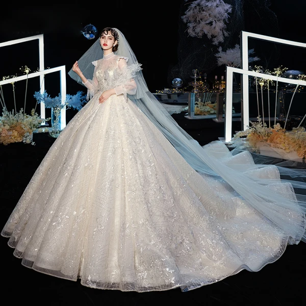 Style Victorien Champagne Transparentes Robe De Mariée 2020 Robe Boule Col Haut Gonflée Manches Longues Dos Nu Glitter Tulle Appliques En Dentelle Perlage Cathedral Train Volants