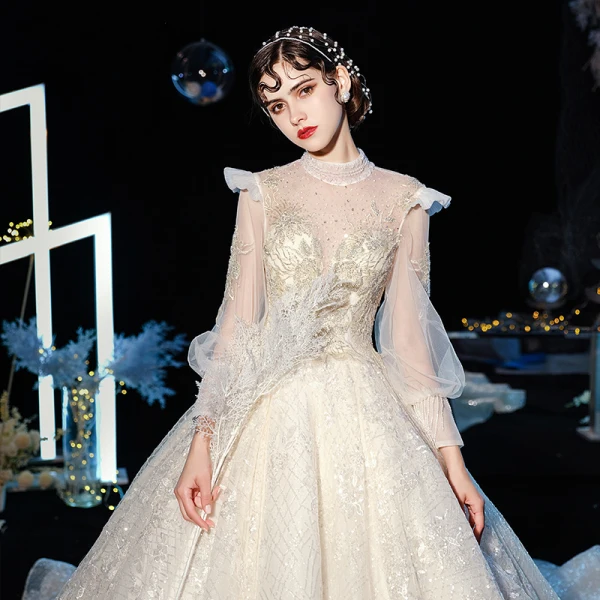 Style Victorien Champagne Transparentes Robe De Mariée 2020 Robe Boule Col Haut Gonflée Manches Longues Dos Nu Glitter Tulle Appliques En Dentelle Perlage Cathedral Train Volants