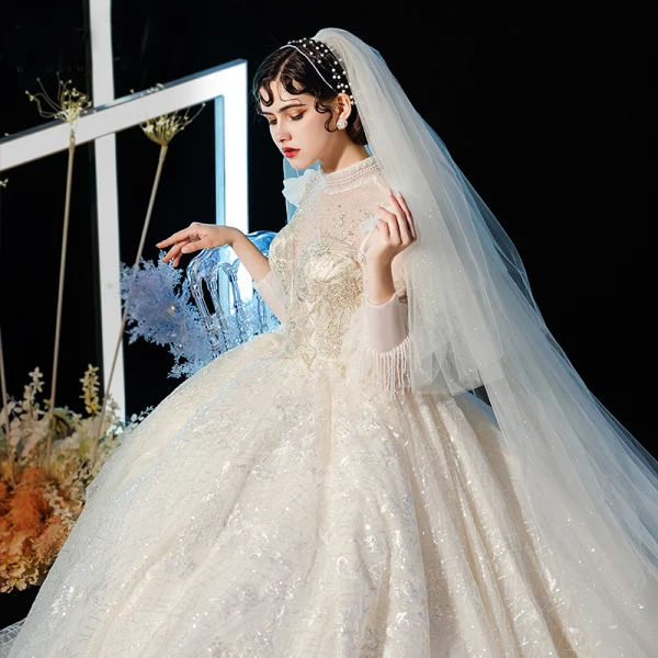 Style Victorien Champagne Transparentes Robe De Mariée 2020 Robe Boule Col Haut Gonflée Manches Longues Dos Nu Glitter Tulle Appliques En Dentelle Perlage Cathedral Train Volants