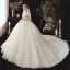 Vintage / Originale Champagne Transparentes Robe De Mariée 2020 Robe Boule Col Haut Manches Courtes Dos Nu Glitter Tulle Appliques En Dentelle Perlage Chapel Train Volants