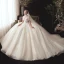 Vintage / Originale Champagne Transparentes Robe De Mariée 2020 Robe Boule Col Haut Manches Courtes Dos Nu Glitter Tulle Appliques En Dentelle Perlage Chapel Train Volants