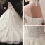 Vintage / Originale Champagne Transparentes Robe De Mariée 2020 Robe Boule Col Haut Manches Courtes Dos Nu Glitter Tulle Appliques En Dentelle Perlage Chapel Train Volants