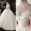 Vintage / Originale Champagne Transparentes Robe De Mariée 2020 Robe Boule Col Haut Manches Courtes Dos Nu Glitter Tulle Appliques En Dentelle Perlage Chapel Train Volants