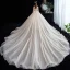 Schöne Champagner Brautkleider / Hochzeitskleider 2020 Ballkleid Neckholder Ärmellos Rückenfreies Perlenstickerei Glanz Tülle Kathedrale Schleppe Rüschen