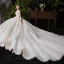 Chic / Belle Champagne Transparentes Robe De Mariée 2020 Robe Boule Encolure Dégagée Sans Manches Dos Nu Appliques En Dentelle Perlage Glitter Tulle Cathedral Train Volants
