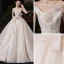 Chic / Belle Champagne Transparentes Robe De Mariée 2020 Robe Boule Encolure Dégagée Sans Manches Dos Nu Appliques En Dentelle Perlage Glitter Tulle Cathedral Train Volants
