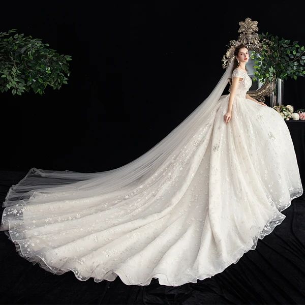 Schöne Ivory / Creme Star Brautkleider / Hochzeitskleider 2020 Ballkleid Durchsichtige Eckiger Ausschnitt Kurze Ärmel Rückenfreies Glanz Tülle Applikationen Spitze Perlenstickerei Kathedrale Schleppe Rüschen