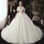 Style Victorien Champagne Transparentes Robe De Mariée 2020 Robe Boule V-Cou Gonflée Manches Courtes Dos Nu Glitter Tulle Appliques En Dentelle Perlage Chapel Train Volants