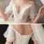 Style Victorien Champagne Transparentes Robe De Mariée 2020 Robe Boule V-Cou Gonflée Manches Courtes Dos Nu Glitter Tulle Appliques En Dentelle Perlage Chapel Train Volants