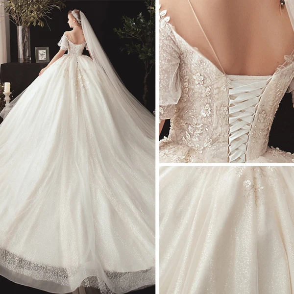 Style Victorien Champagne Transparentes Robe De Mariée 2020 Robe Boule V-Cou Gonflée Manches Courtes Dos Nu Glitter Tulle Appliques En Dentelle Perlage Chapel Train Volants