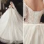 Style Victorien Champagne Transparentes Robe De Mariée 2020 Robe Boule V-Cou Gonflée Manches Courtes Dos Nu Glitter Tulle Appliques En Dentelle Perlage Chapel Train Volants