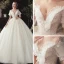 Style Victorien Champagne Transparentes Robe De Mariée 2020 Robe Boule V-Cou Gonflée Manches Courtes Dos Nu Glitter Tulle Appliques En Dentelle Perlage Chapel Train Volants