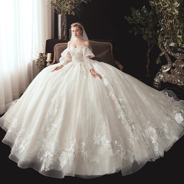 Victorian Style Champagne Wedding Dresses 2020 Ball Gown Off-The-Shoulder Puffy Long Sleeve Backless Glitter Tulle Appliques Lace Beading Chapel Train Ruffle