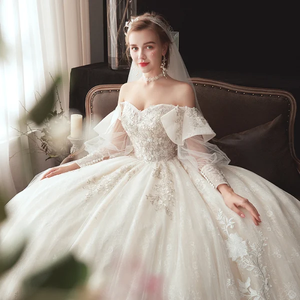 Victorian Style Champagne Wedding Dresses 2020 Ball Gown Off-The-Shoulder Puffy Long Sleeve Backless Glitter Tulle Appliques Lace Beading Chapel Train Ruffle