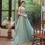 Élégant Vert Robe De Soirée 2020 Princesse Bretelles Spaghetti Sans Manches Appliques Fleur Plumes Perlage Train De Balayage Volants Dos Nu Robe De Ceremonie