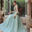 Élégant Vert Robe De Soirée 2020 Princesse Bretelles Spaghetti Sans Manches Appliques Fleur Plumes Perlage Train De Balayage Volants Dos Nu Robe De Ceremonie