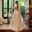 Élégant Champagne Robe De Soirée 2020 Princesse Bretelles Spaghetti Sans Manches Perlage Glitter Tulle Train De Balayage Volants Dos Nu Robe De Ceremonie