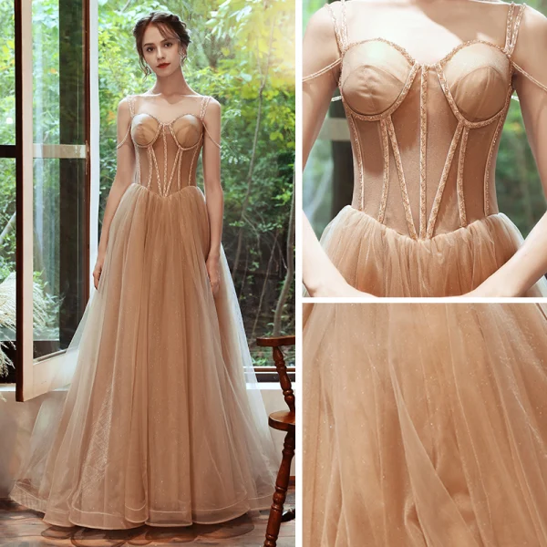 Élégant Champagne Robe De Soirée 2020 Princesse Bretelles Spaghetti Sans Manches Perlage Glitter Tulle Train De Balayage Volants Dos Nu Robe De Ceremonie