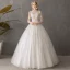 Abordable Ivoire Transparentes Jardin / Extérieur Robe De Mariée 2019 Robe Boule Col Haut Dos Nu 3/4 Manches Étoile Appliques En Dentelle Longue Volants