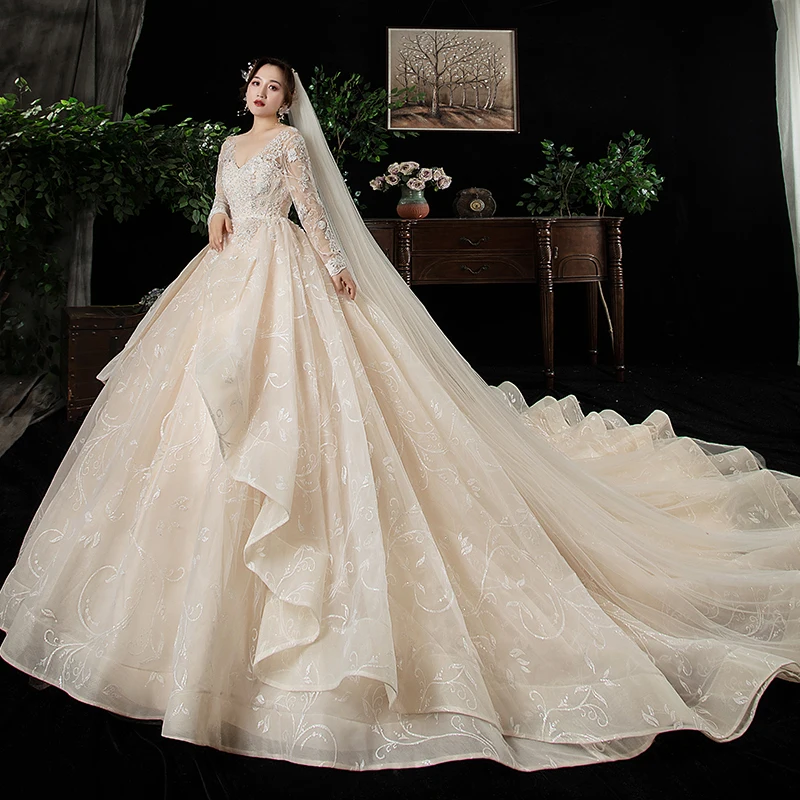 Chic Beautiful Champagne Plus Size Wedding Dresses 2020 Ball Gown V Neck  Long Sleeve Backless Appliques Lace Beading Cathedral Train Ruffle