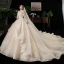 Schöne Champagner Plus Größe Brautkleider / Hochzeitskleider 2020 Ballkleid V-Ausschnitt Lange Ärmel Rückenfreies Applikationen Spitze Perlenstickerei Kathedrale Schleppe Rüschen