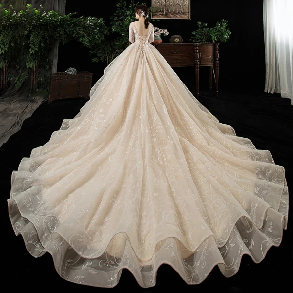 Schöne Champagner Plus Größe Brautkleider / Hochzeitskleider 2020 Ballkleid V-Ausschnitt Lange Ärmel Rückenfreies Applikationen Spitze Perlenstickerei Kathedrale Schleppe Rüschen