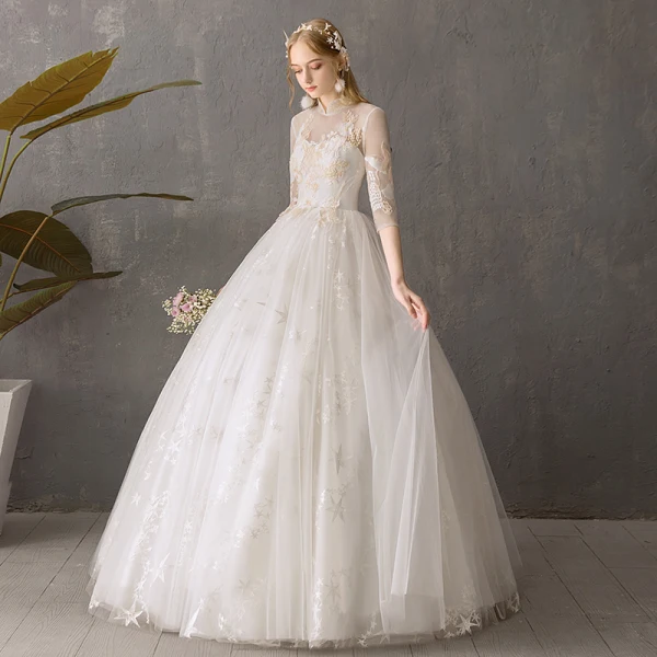 Abordable Ivoire Transparentes Jardin / Extérieur Robe De Mariée 2019 Robe Boule Col Haut Dos Nu 3/4 Manches Étoile Appliques En Dentelle Longue Volants