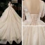 Schöne Champagner Plus Größe Brautkleider / Hochzeitskleider 2020 Ballkleid V-Ausschnitt Lange Ärmel Rückenfreies Applikationen Spitze Perlenstickerei Kathedrale Schleppe Rüschen