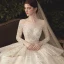 Charming Champagne See-through Wedding Dresses 2020 Ball Gown Scoop Neck Long Sleeve Backless Glitter Appliques Lace Court Train Ruffle