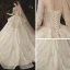 Charming Champagne See-through Wedding Dresses 2020 Ball Gown Scoop Neck Long Sleeve Backless Glitter Appliques Lace Court Train Ruffle