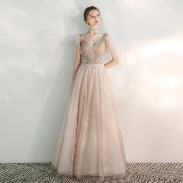 Chic Beautiful Champagne Evening Dresses 2020 A Line Princess Spaghetti Straps V Neck Sleeveless Spotted Tulle Appliques Lace Beading Floor Length Long Ruffle Backless Formal Dresses