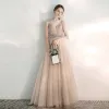 Chic / Beautiful Champagne Evening Dresses  2020 A-Line / Princess Spaghetti Straps V-Neck Sleeveless Spotted Tulle Appliques Lace Beading Floor-Length / Long Ruffle Backless Formal Dresses