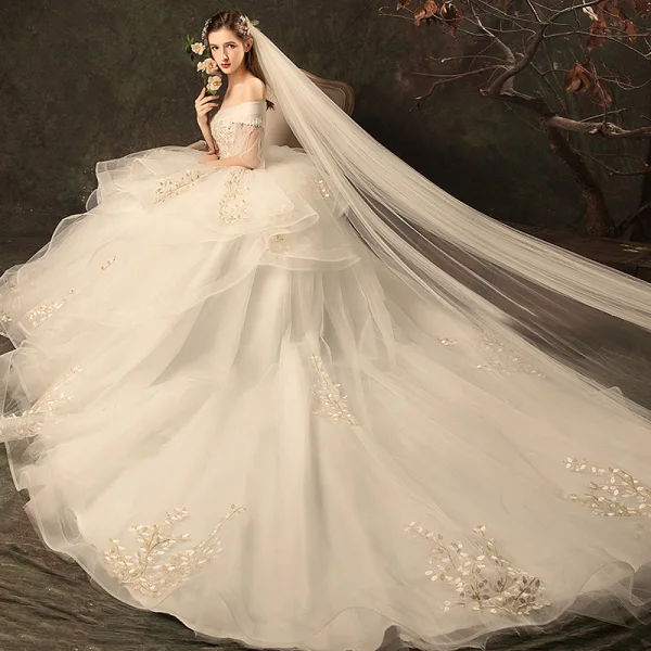 Affordable Champagne Wedding Dresses 2019 Ball Gown Off-The-Shoulder Bell sleeves Backless Appliques Lace Beading Chapel Train Cascading Ruffles