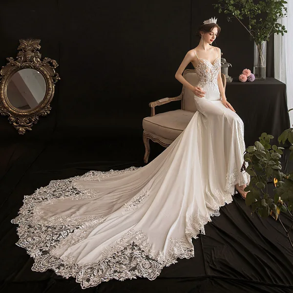 Sexy Ivoire Légère La Mariée Robe De Mariée 2020 Trompette / Sirène Bretelles Spaghetti Sans Manches Dos Nu Appliques En Dentelle Perlage Chapel Train Volants