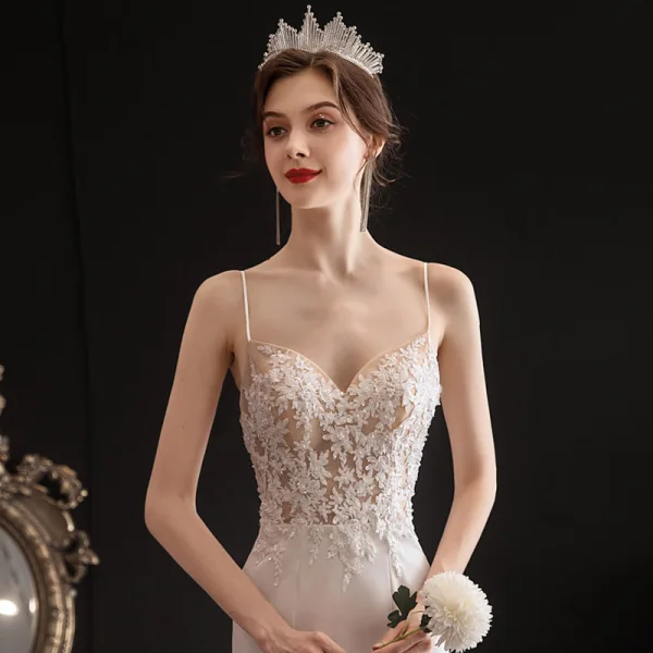Sexy Ivoire Légère La Mariée Robe De Mariée 2020 Trompette / Sirène Bretelles Spaghetti Sans Manches Dos Nu Appliques En Dentelle Perlage Chapel Train Volants