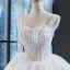 Best Ivory Wedding Dresses 2023 Ball Gown Shoulders Sleeveless Backless Appliques Lace Beading Cathedral Train Ruffle