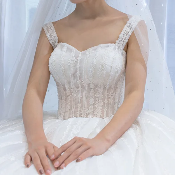 Best Ivory Wedding Dresses 2023 Ball Gown Shoulders Sleeveless Backless Appliques Lace Beading Cathedral Train Ruffle