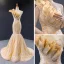 Haut de Gamme Champagne Doré Robe De Soirée 2023 Trompette / Sirène Une épaule Sans Manches Feuille Appliques En Dentelle Paillettes Chapel Train Dos Nu Robe De Ceremonie