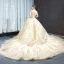 Haut de Gamme Champagne Transparentes Robe De Bal 2023 Robe Boule Encolure Carrée Manches Longues Perlage Glitter Appliques Paillettes Cathedral Train Volants Dos Nu