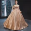 Scintillantes Champagne Paillettes Dansant Robe De Bal 2023 Robe Boule Transparentes Encolure Dégagée Sans Manches Longue Volants Dos Nu Robe De Ceremonie