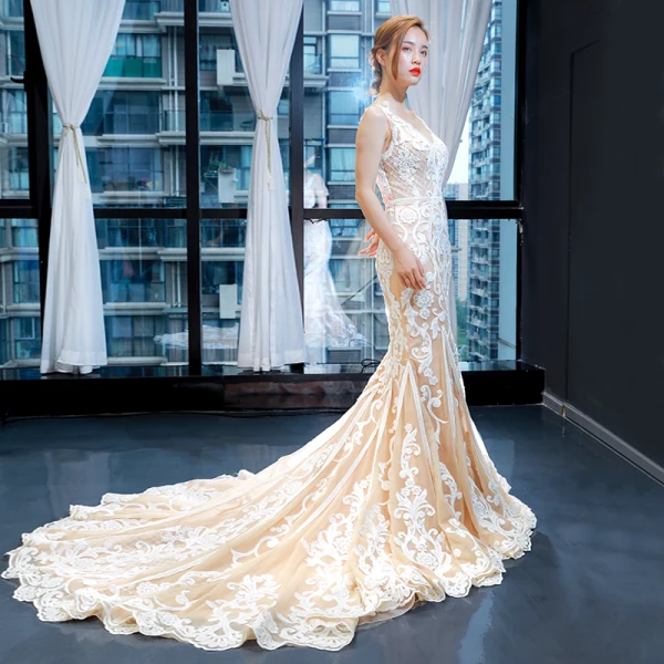 Luxury / Gorgeous Champagne Wedding Dresses 2023 Trumpet / Mermaid V-Neck Sleeveless Backless Appliques Lace Chapel Train Ruffle