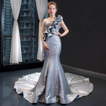 Sparkly Silver Red Carpet Evening Dresses 2023 Trumpet Mermaid One Shoulder Sleeveless Appliques Lace Sequins Chapel Train Ruffle Backless Formal Dresses