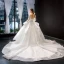 Illusion Blanche Transparentes La Mariée Robe De Mariée 2023 Robe Boule Encolure Carrée Manches Longues Dos Nu Appliques En Dentelle Perlage Chapel Train Volants