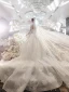 Illusion Blanche Transparentes La Mariée Robe De Mariée 2023 Robe Boule Encolure Carrée Manches Longues Dos Nu Appliques En Dentelle Perlage Chapel Train Volants