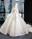 Illusion Blanche Transparentes La Mariée Robe De Mariée 2023 Robe Boule Encolure Carrée Manches Longues Dos Nu Appliques En Dentelle Perlage Chapel Train Volants