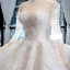 Illusion Blanche Transparentes La Mariée Robe De Mariée 2023 Robe Boule Encolure Carrée Manches Longues Dos Nu Appliques En Dentelle Perlage Chapel Train Volants
