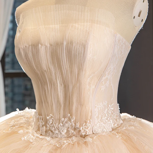 High-end Champagne Bridal Wedding Dresses 2023 Ball Gown Strapless Sleeveless Backless Appliques Lace Cathedral Train Ruffle