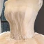 High-end Champagne Bridal Wedding Dresses 2023 Ball Gown Strapless Sleeveless Backless Appliques Lace Cathedral Train Ruffle