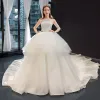 High-end Champagne Bridal Wedding Dresses 2023 Ball Gown Strapless Sleeveless Backless Appliques Lace Cathedral Train Ruffle